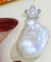 Sterling silver empty pearl holder pendant for water drop and baroque pearls, shown without a pearl