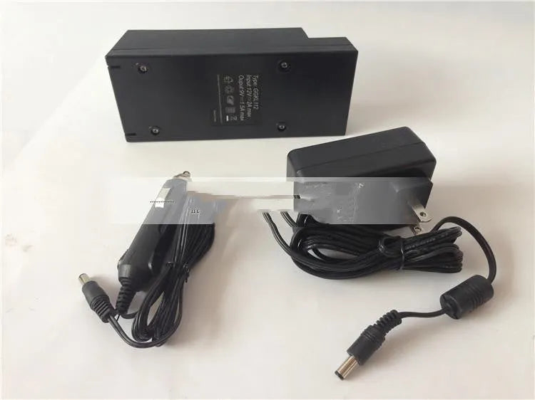 GKL112 compact white dual USB-A port car charger plugged into a vehicle's 12V socket.