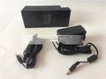 GKL112 compact white dual USB-A port car charger plugged into a vehicle's 12V socket.