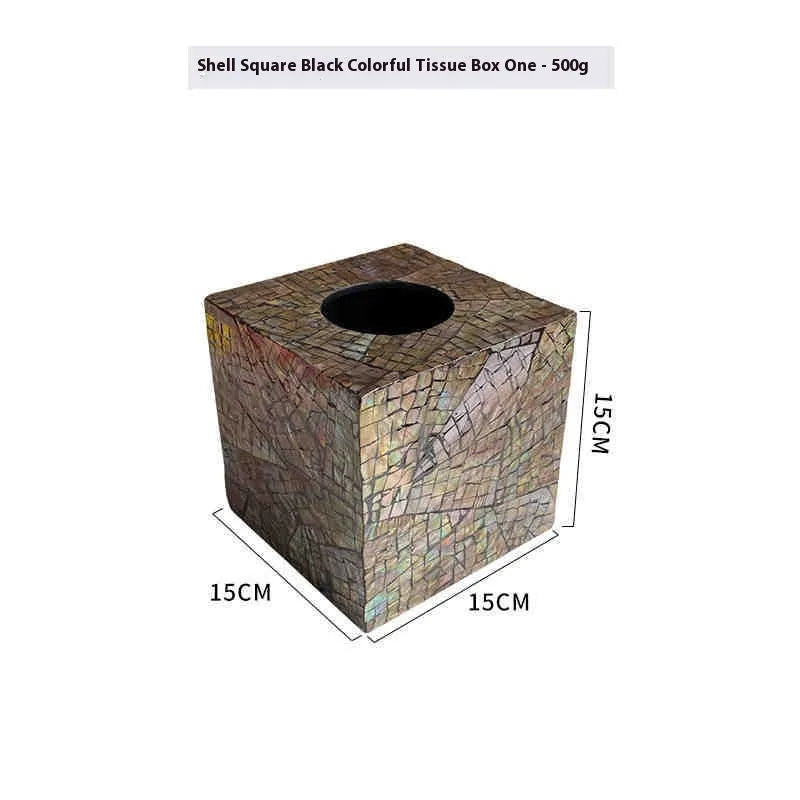 Black natural shell tissue storage box in rectangular and square shape options on a coffee table.