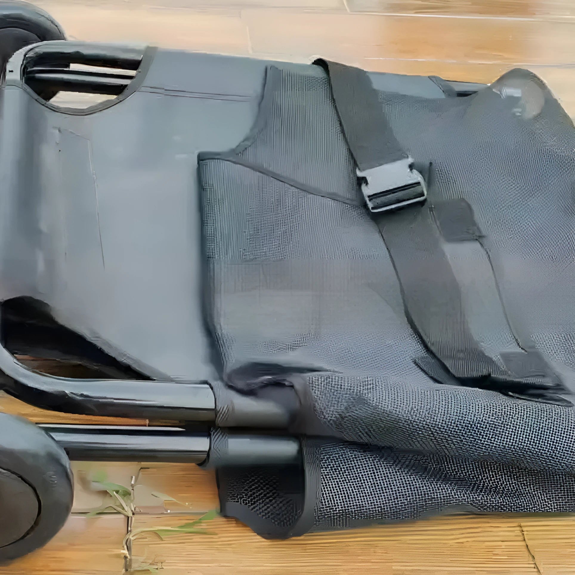 Large black foldable aluminium pet stretcher for dogs and cats showing folded and unfolded positions