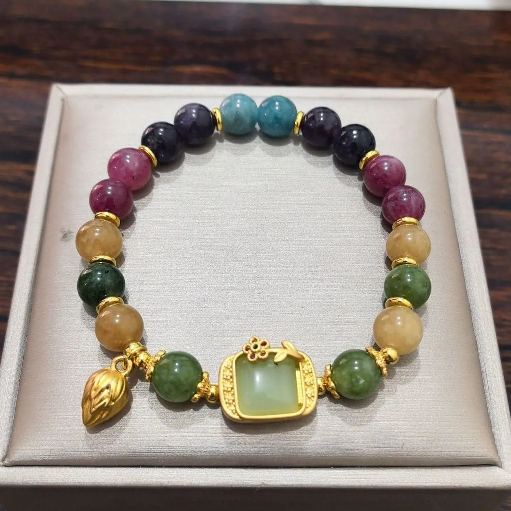 Women's pink crystal and electroplated alloy bracelet with geometric shapes in one of eight colour options.