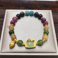 Women's pink crystal and electroplated alloy bracelet with geometric shapes in one of eight colour options.