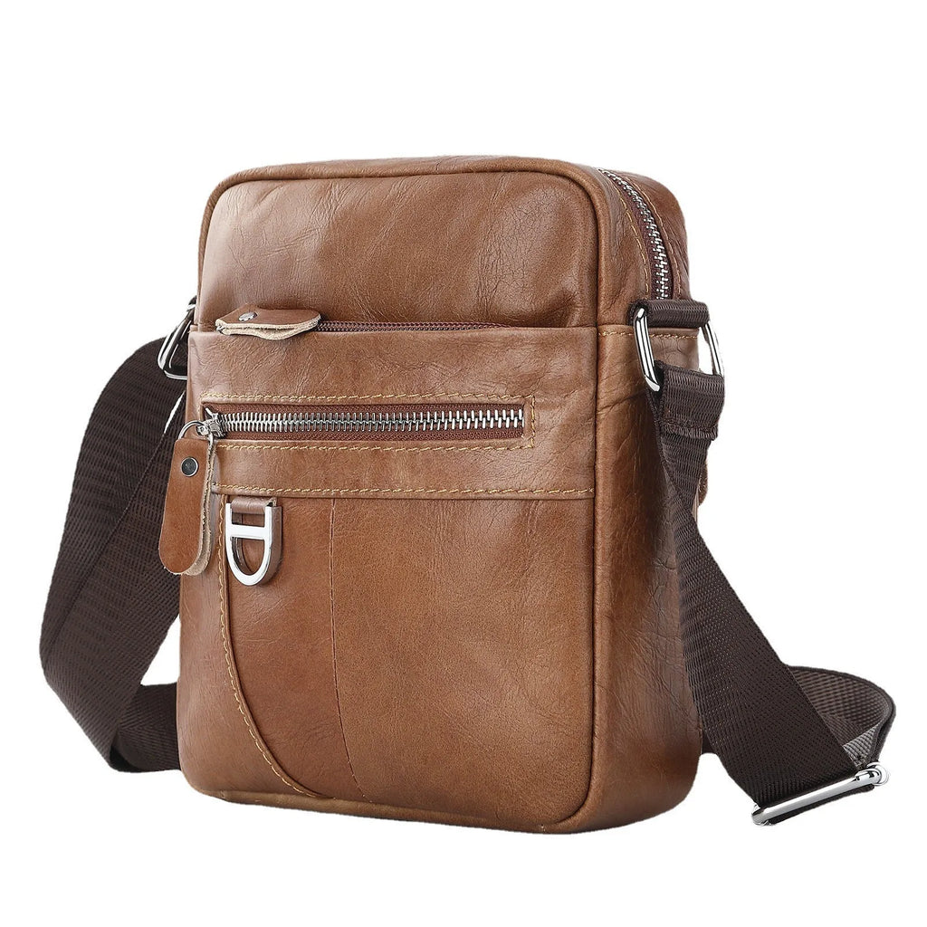 Black leather messenger bag with crossbody strap and visible sewing lines