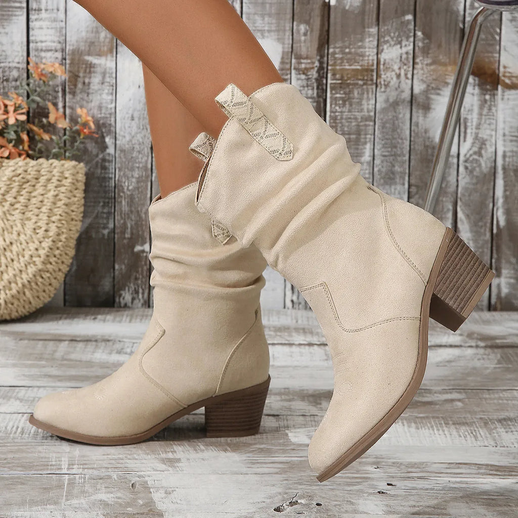 Women's suede mid-calf boots in lotus root colour with a block heel and leather stitching detail.