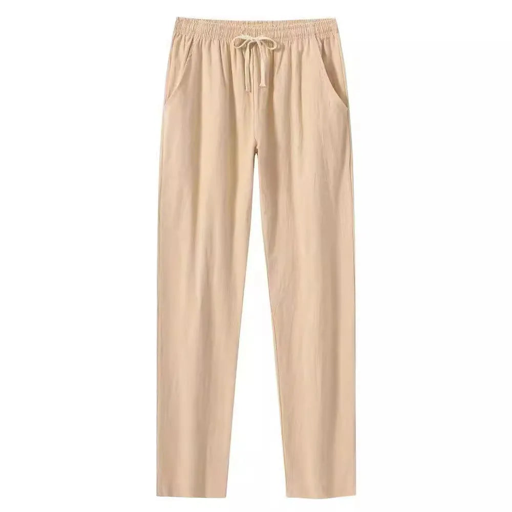 Men's cotton linen beach trousers in loose fit showing solid colour options