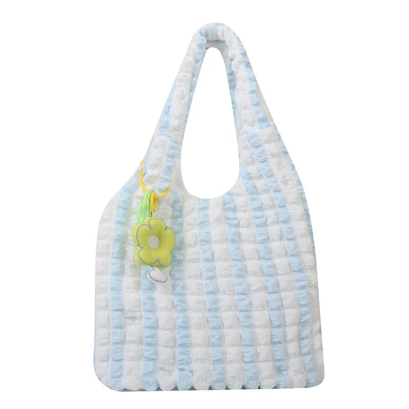 Women's soft pleated bubble shoulder bag in a vertical square shape with a pendant, shown in one of five colour options.
