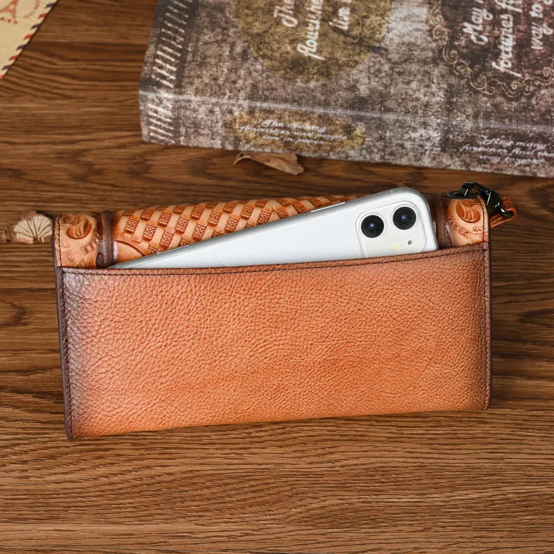 Retro brown tri-fold leather wallet with embossed floral pattern, shown open to reveal multiple card slots and compartments.