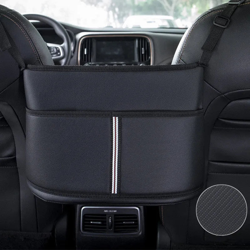 Black leather car seat storage bag with a carbon fibre pattern, showing its size next to a car seat.