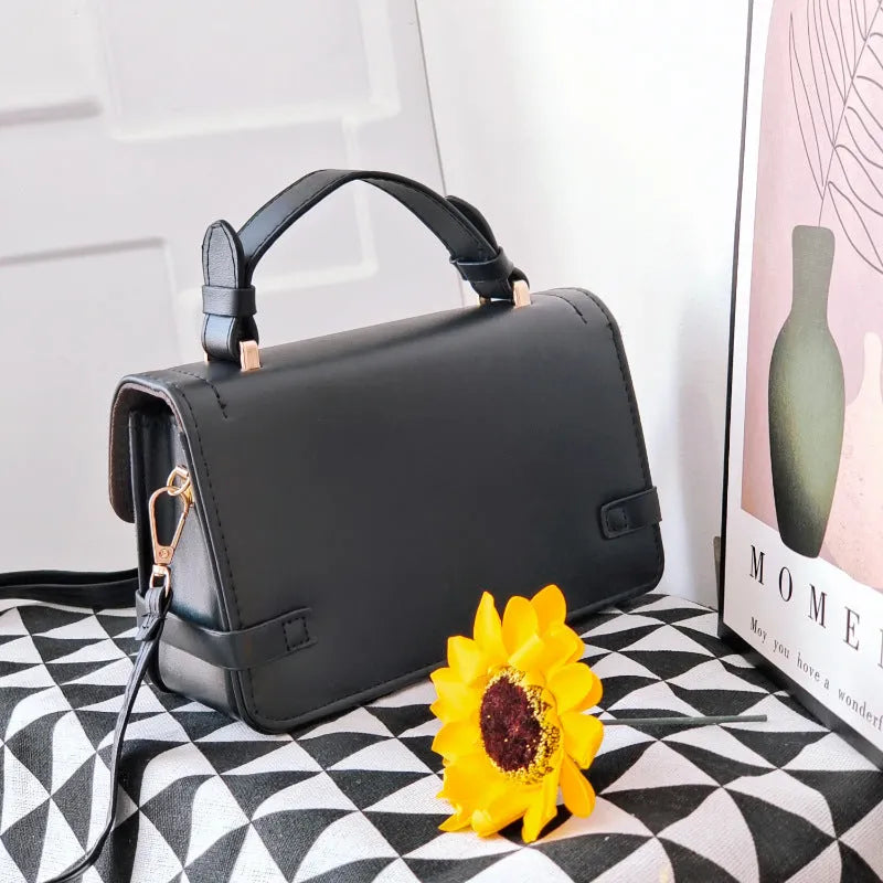 Retro square patterned women's crossbody bag in PU leather showing floral design.