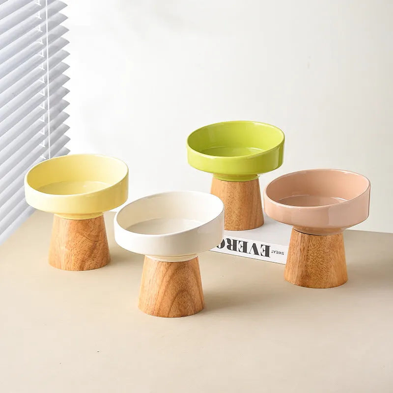 Set of four ceramic pet feeding bowls in beige green khaki and yellow colours for cats and small dogs