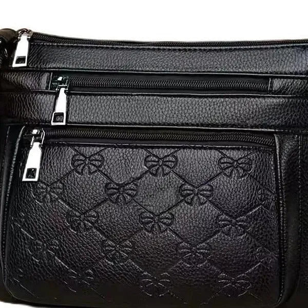 Butterfly black women's PU leather messenger bag with embossed texture and horizontal square shape