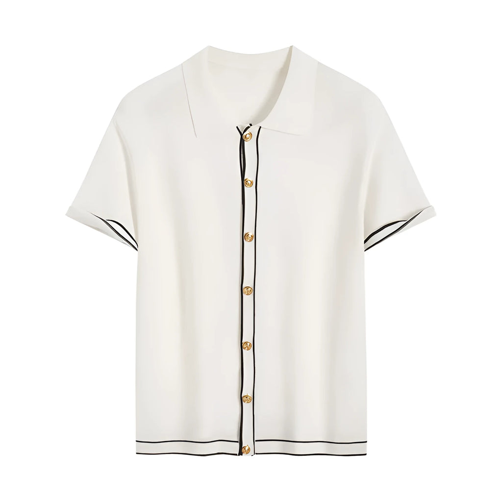 White short sleeve cardigan with dark contrast lapels, buttoned front, and a soft drape fabric.