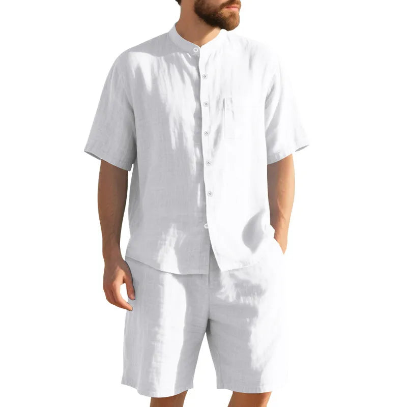 Men's light blue linen blend summer suit with short sleeves and shorts on a hanger.