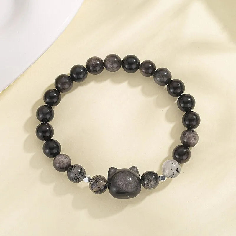 Cat crystal couple bracelet with obsidian stone and silver electroplating featuring cat charm