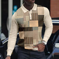 Men's grey long-sleeved top with raised 3D printed black stripes, showing textured casual design.