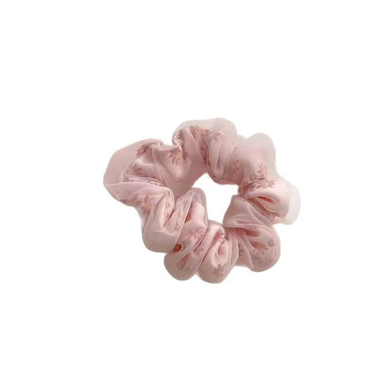 Mesh sense bun cloth hair band for women in milky white, pink, and light blue with large intestine style