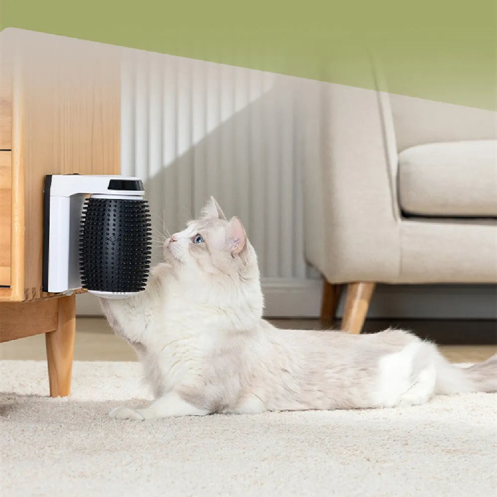 White automatic cat self groomer mounted in corner with silicone bristles for brushing