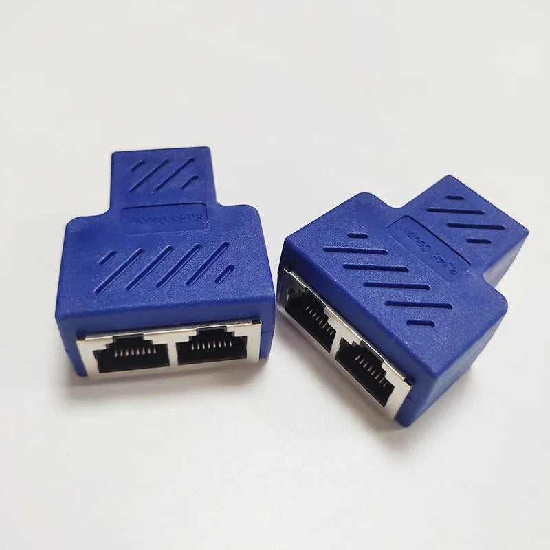 Two white RJ45 network tee splitters, one male to two female ports.