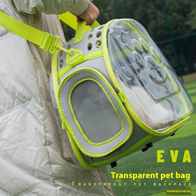 Transparent hard-shell cat backpack in grass green colour with shoulder straps, showing interior space dimensions