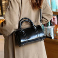 Cortex lady casual zip crossbody bag in top grain leather, cylindrical shape, shown in available colours