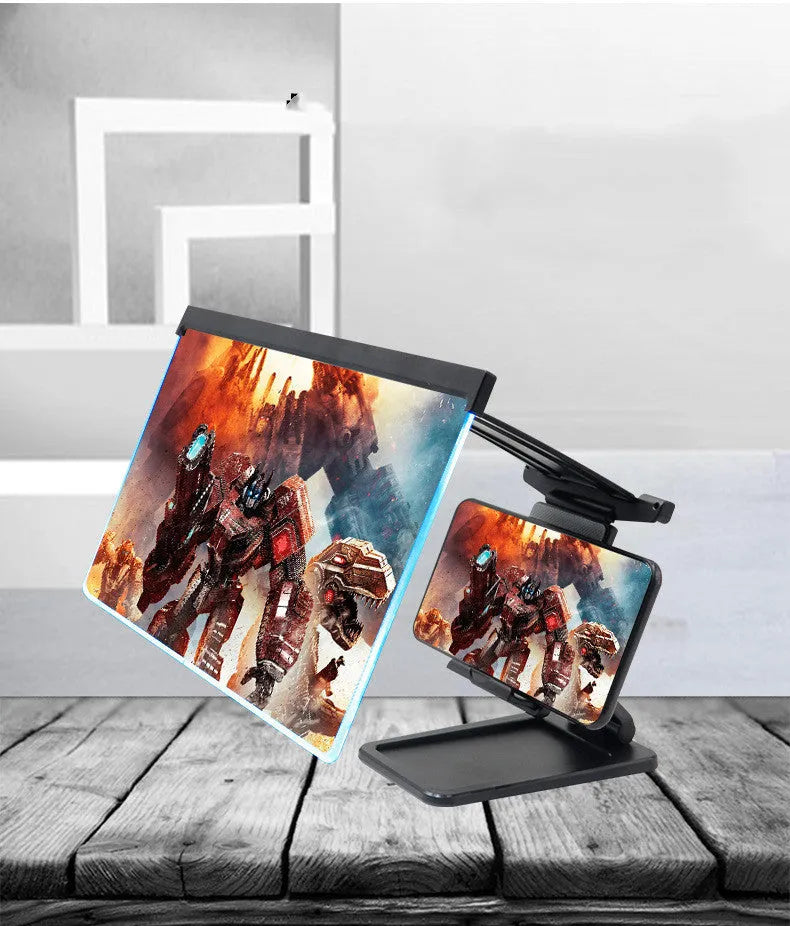 Black folding mobile phone screen magnifier and adjustable holder on a desktop.