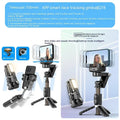 Black anti-shake phone stand with retractable selfie stick and desktop pan tilt on table