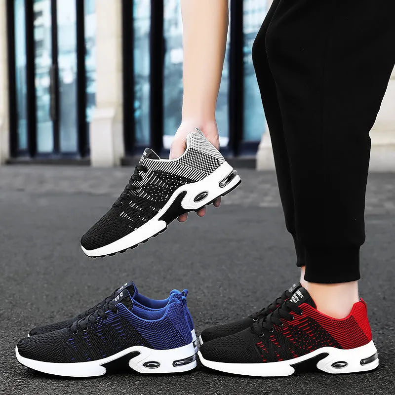 Men's low-top Flyknit mesh sneakers in black and grey colourway with lace-up front