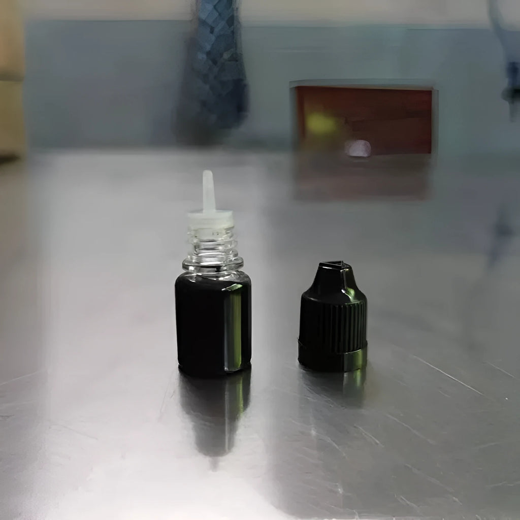 A 5ml bottle of black quick-dry confidentiality seal ink for office stamp seals.
