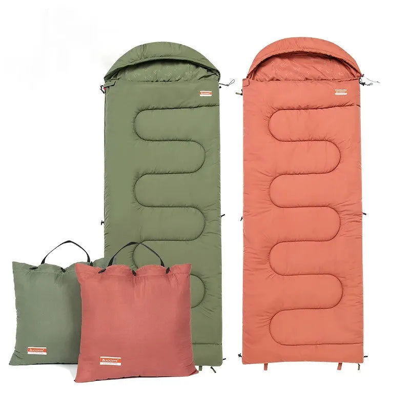 Outdoor cotton sleeping bag quilt rolled up, shown in ochre and olive green colour options.