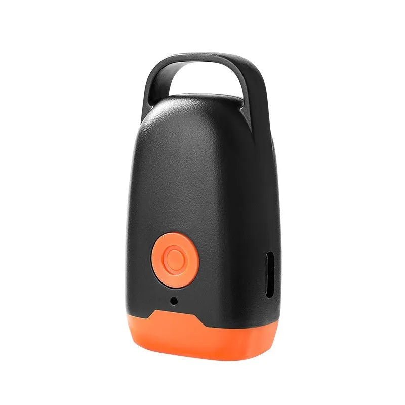 Mini ultrasonic dog dispeller in black and orange ABS casing measuring 3x2x6cm