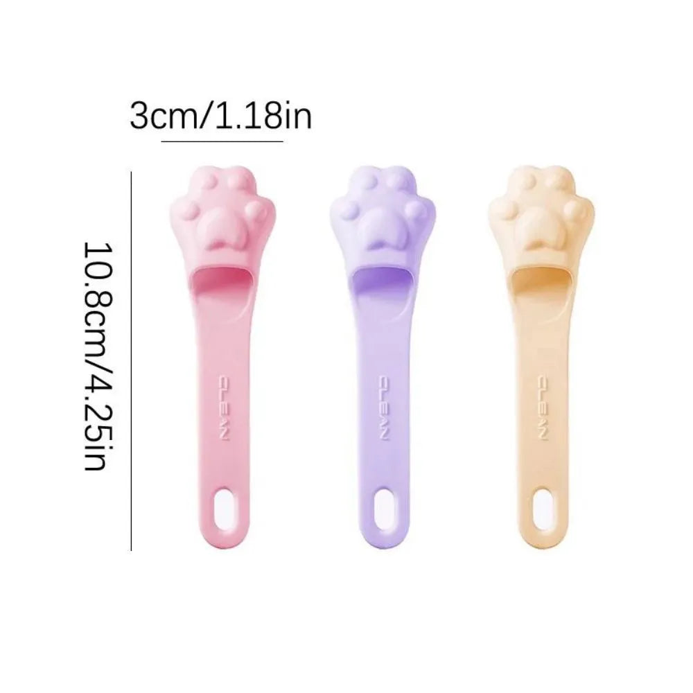 Silicone finger toothbrush for pets in pink, purple and yellow colours for dog and cat dental care