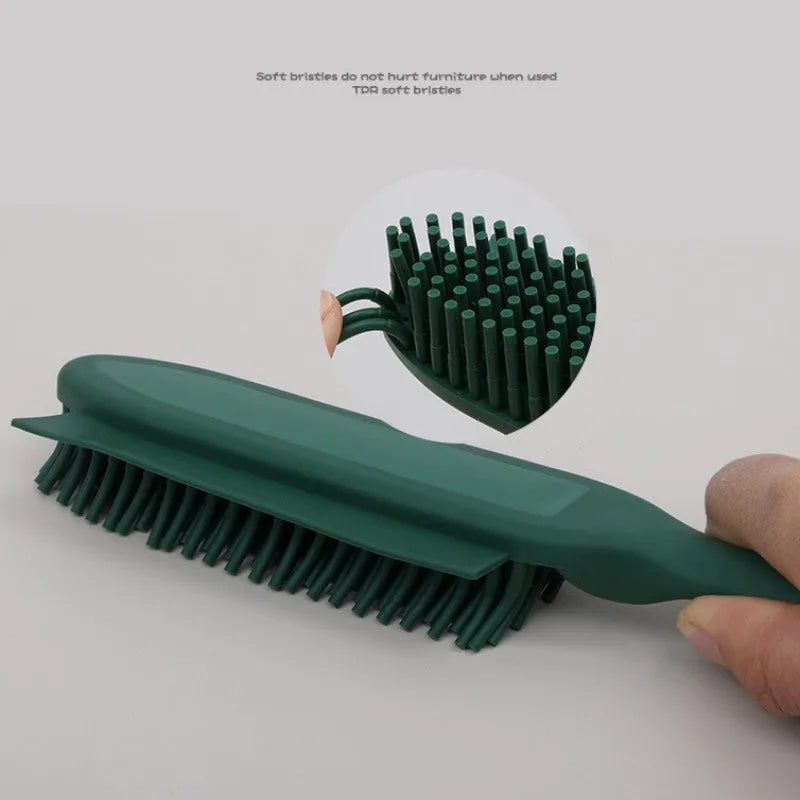 Green and pink dual-use dog brush and sticky clothes hair remover for pet grooming.