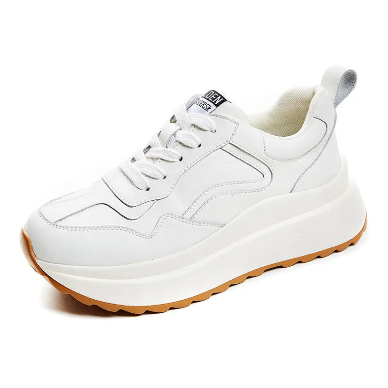 Women's beige low-top casual leather sports shoes with lace-up front and cross-strap detail on a white background