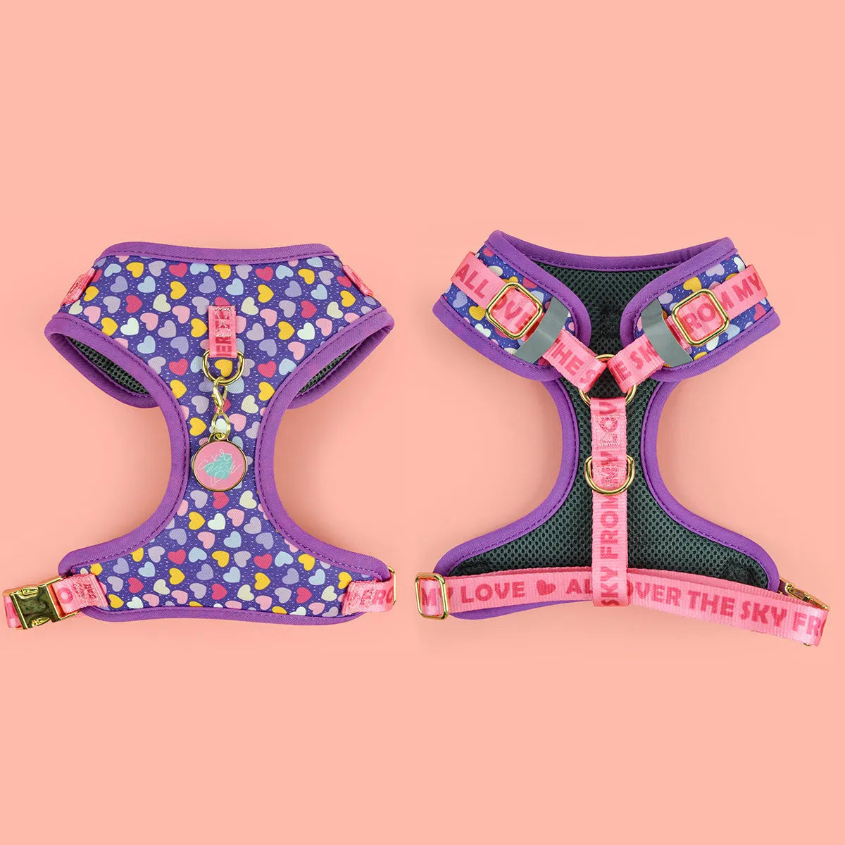 Adjustable polyester dog breast strap harness in Pink Avocado colour on a wooden surface