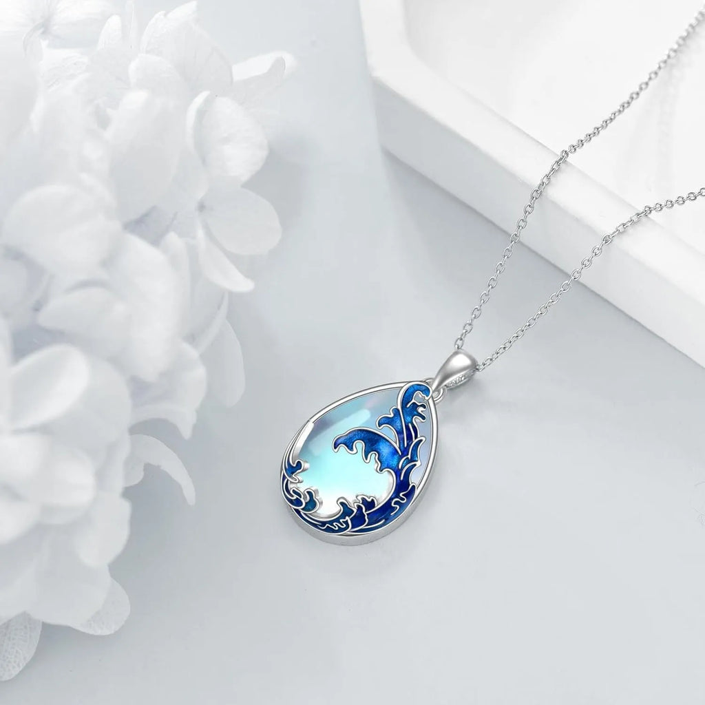 Blue heart-shaped alloy pendant on a women's necklace.