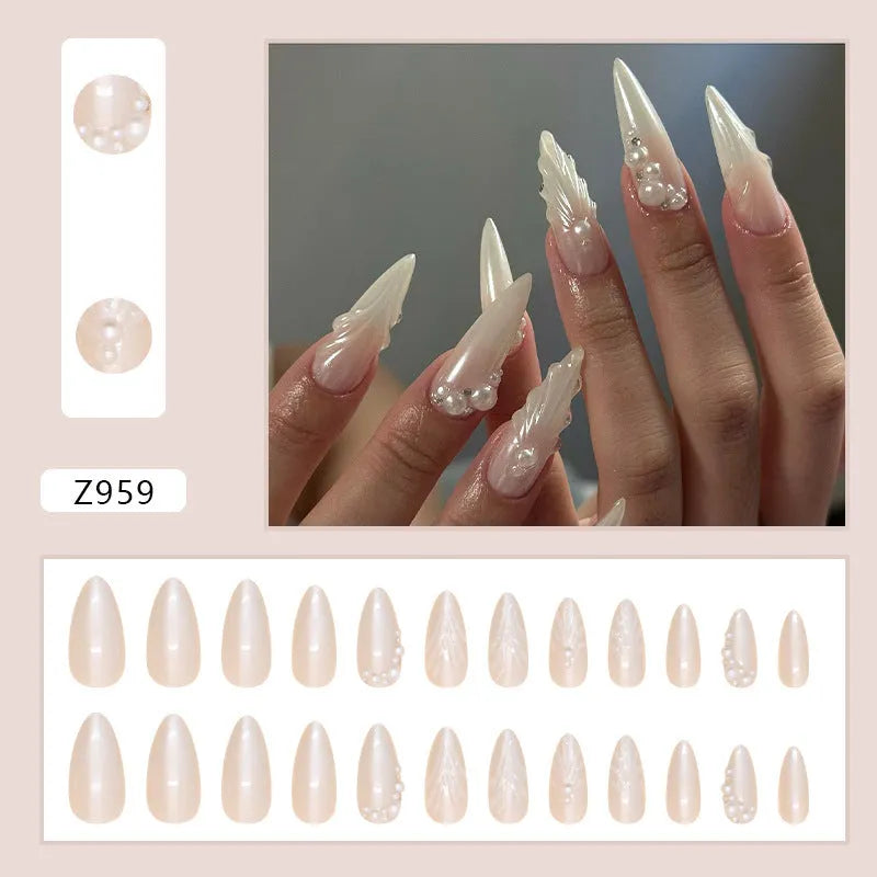 24 pieces of white press-on artificial nail tips with diamond sparkle finish in a pack