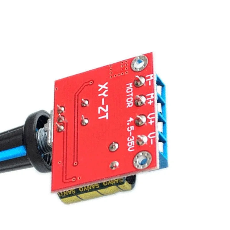 PWM DC motor speed controller module with potentiometer knob, 30mm x 26mm dimensions.