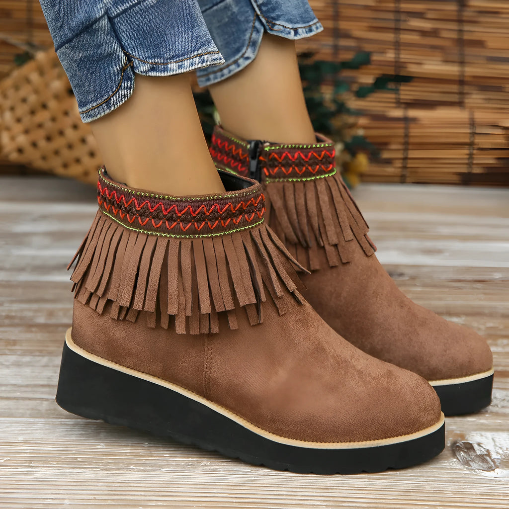 Women's suede wedge ankle boots in dark brown with a side zipper and thick rubber sole.