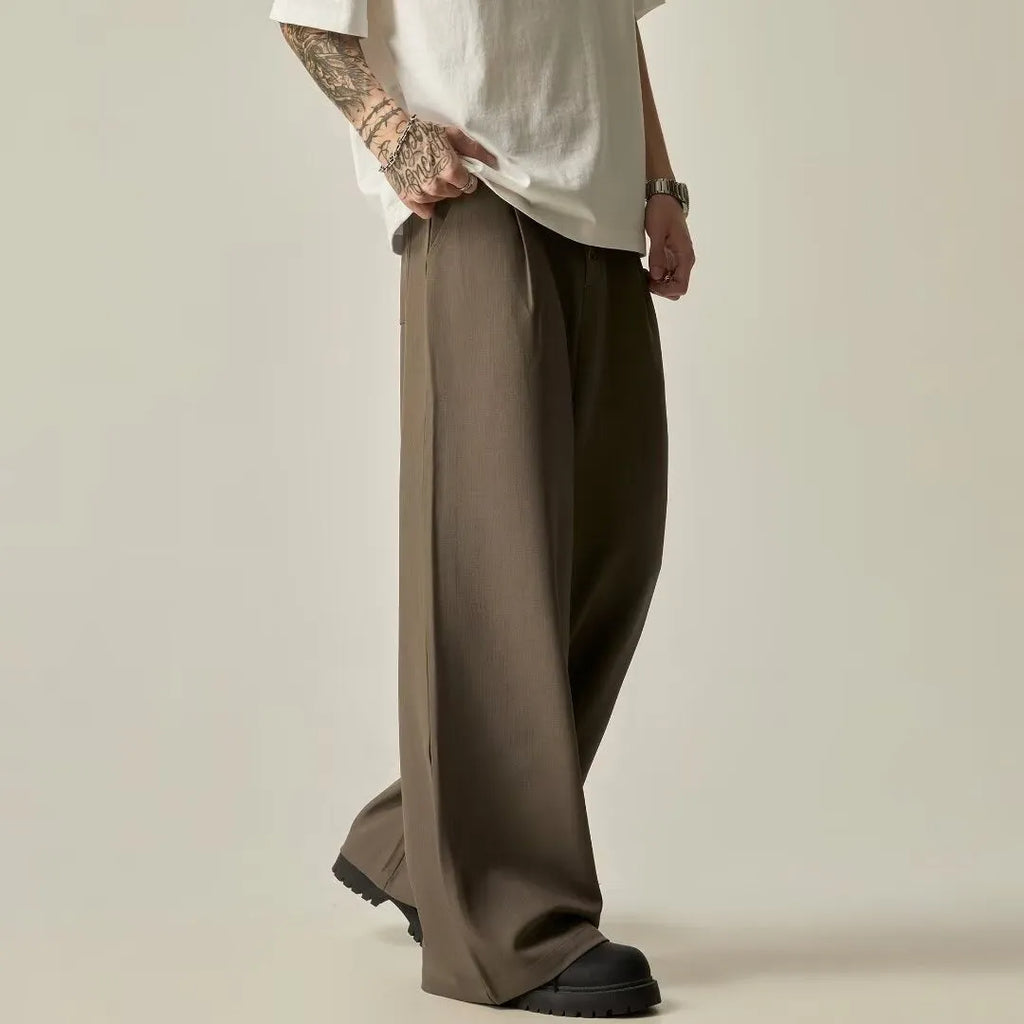 Men's black solid colour wide-leg casual trousers with a straight-leg cut and button fly.