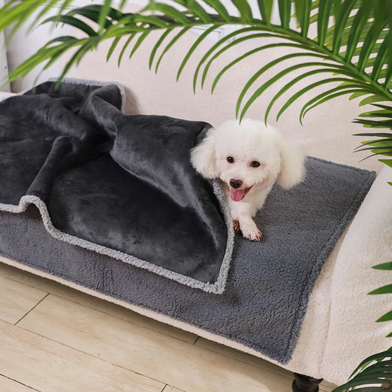 Flannel fleece composite thickened waterproof pet pad for dogs in blue gray on a floor
