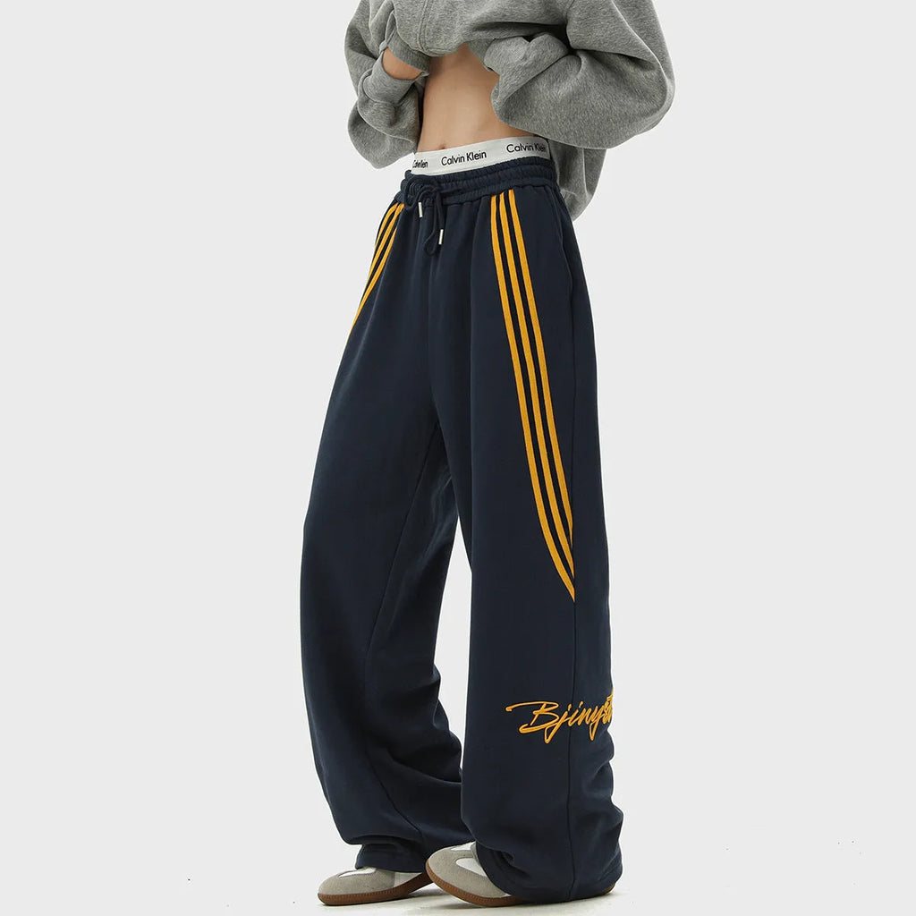 Men's striped loose straight-leg casual pants in polyester stretch fabric with wrinkle-free finish, Black colour