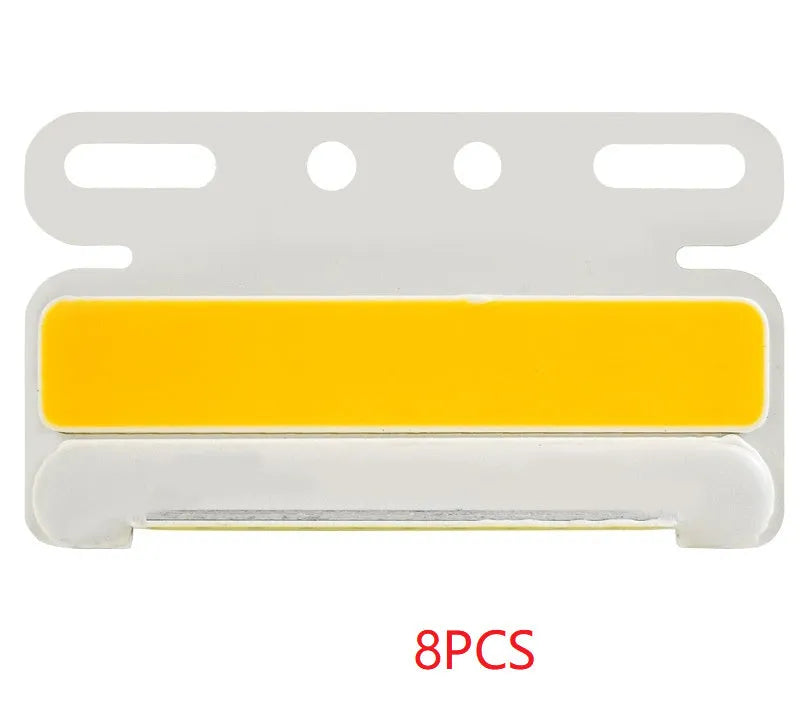 Waterproof aluminium alloy LED side light for trucks, showing bright COB illumination in blue, mounted near a vehicle tyre.