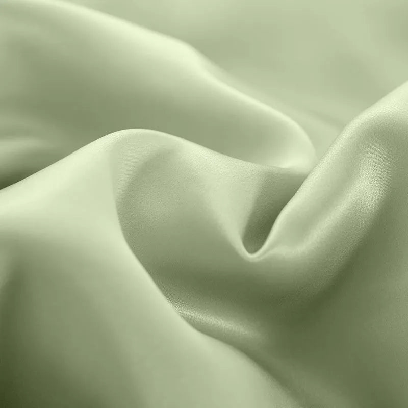 Silk duvet cover in solid colour, showing double-sided silk material and plain weave texture.