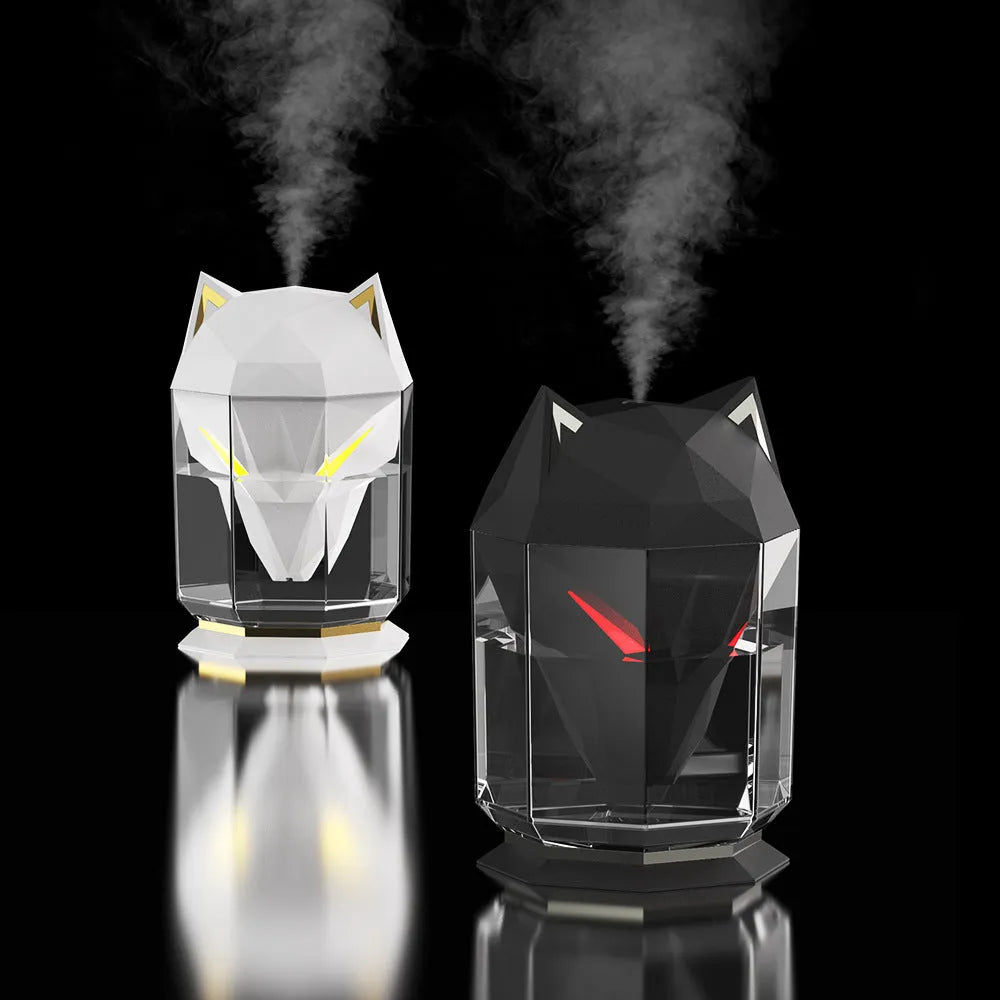 War Wolf ultrasonic air humidifier with colourful LED lights on desktop next to USB cable