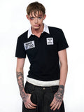 Black slim fit men's short sleeve polo shirt with embroidery detail on front