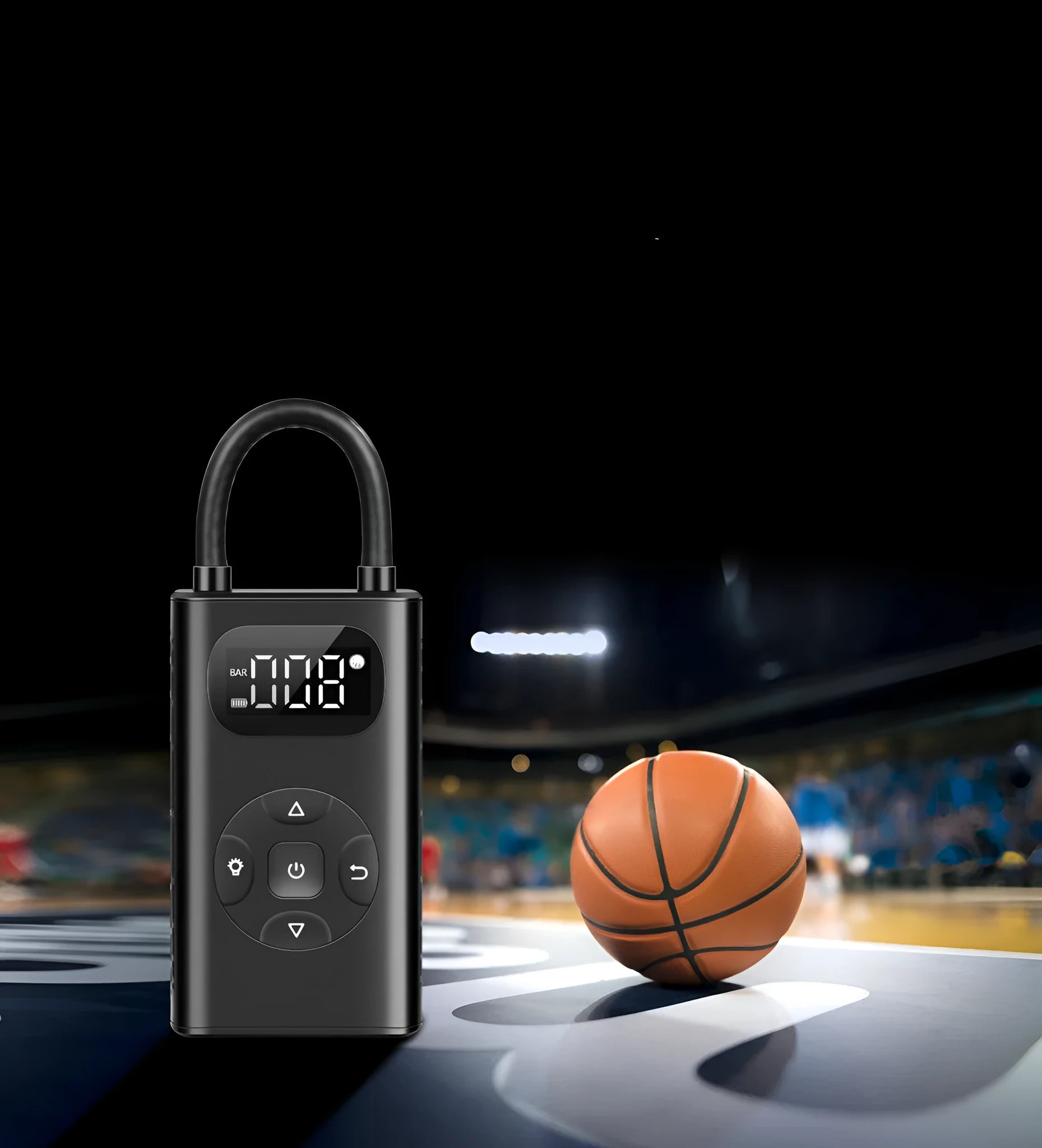 Black portable power bank tyre inflator with USB cable on a grey background.