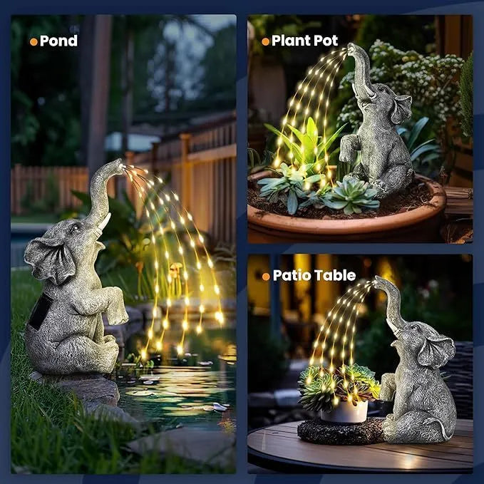 Grey resin elephant outdoor garden statue with integrated LED light strip.