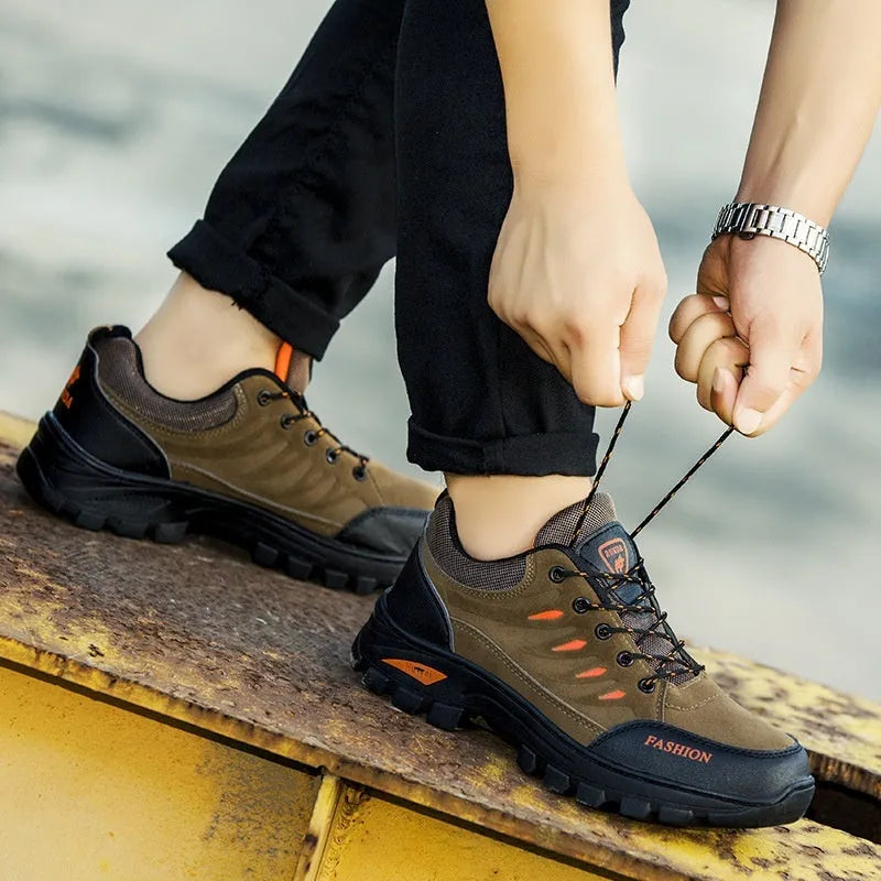 Men's green suede mid-top hiking shoes with rubber sole and lace-up front.