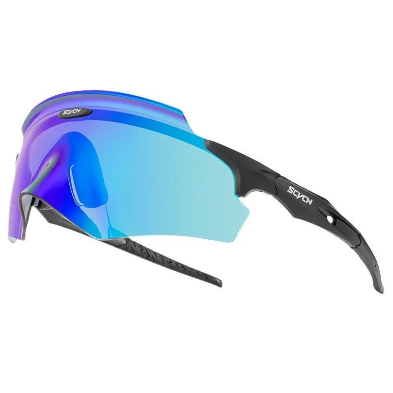 Frameless windproof sports goggles with a colourful one-piece lens on a neutral background.